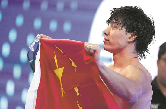 Qin claims gold, Yu wins hearts at Singapore Worlds