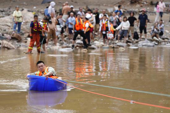 China activates Level-IV emergency response for flood control in multiple regions